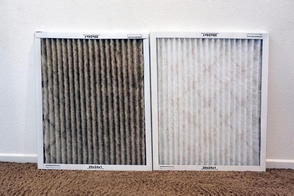 A side by side comparison of a dirty air filter on the viewer's left, and a clean one on the right.