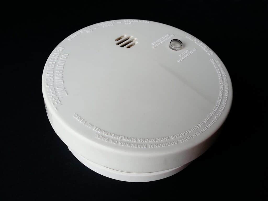 Standard white colored smoke alarm for use in residential properties.