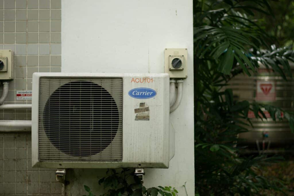 Older outdoor Carrier Air Conditioning Unit.